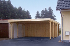 Doppelcarport Akzent mit Holzblende und Geräteraum